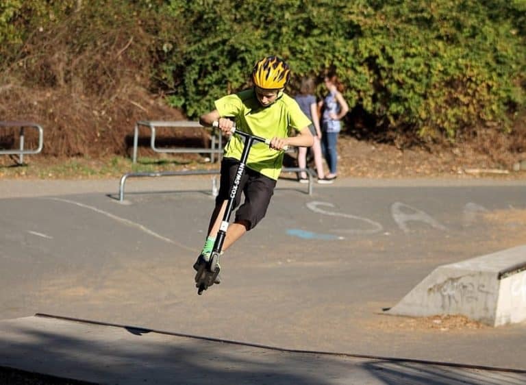 13 Best Freestyle Scooter Tricks For Beginners - Skateboarding In