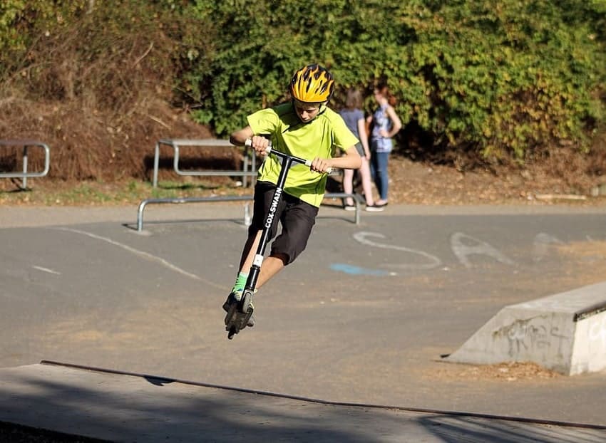 13 Best Freestyle Scooter Tricks For Beginners - Skateboarding In